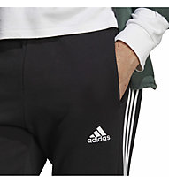 adidas Essentials French Terry Tapered Elastic Cuff 3 Stripes - pantaloni fitness - uomo, Black